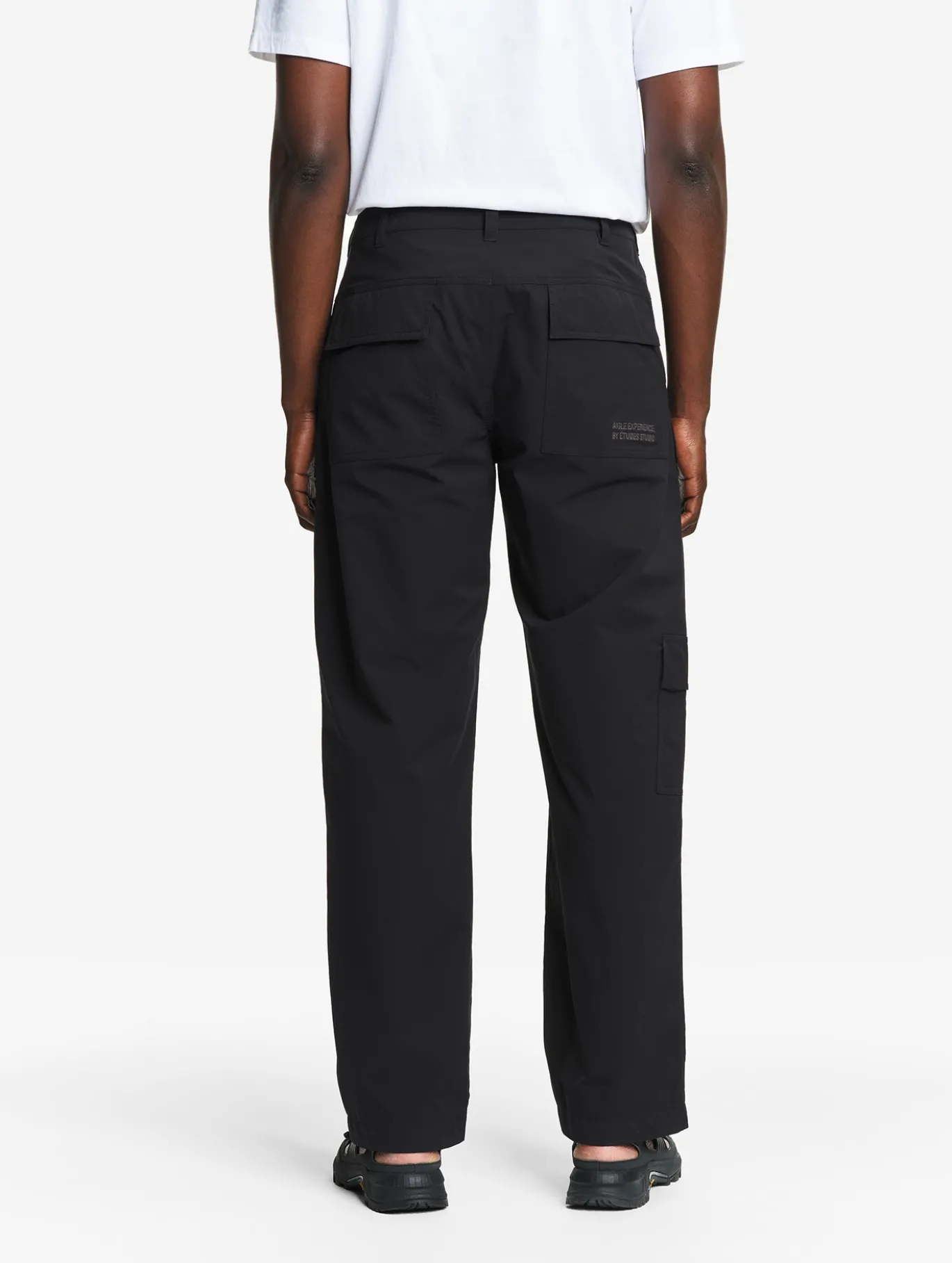 Le pantalon mixte multipoches Aigle Experience by Études - Noir