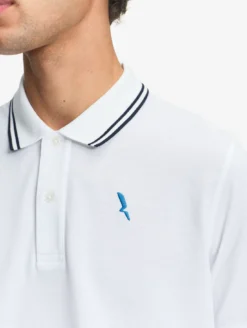 Polo Dry Fast™ à col rabattu avec logo sur la poitrine - Blanc