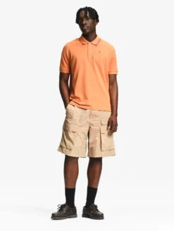 Polo Dry Fast™ à col rabattu avec logo sur la poitrine - Orange