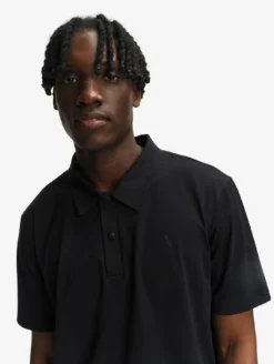 Polo Dry Fast™ TEXTILE® anti-UV avec logo sur la poitrine - Noir