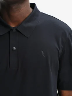 Polo Dry Fast™ TEXTILE® anti-UV avec logo sur la poitrine - Noir