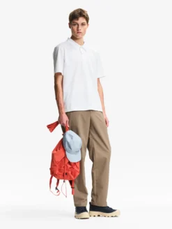 Polo Dry Fast™ TEXTILE® anti-UV avec logo sur la poitrine - Blanc