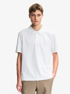 Polo Dry Fast™ TEXTILE® anti-UV avec logo sur la poitrine - Blanc