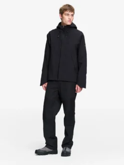 Veste technique à capuche Aigle Experience by Études - Noir