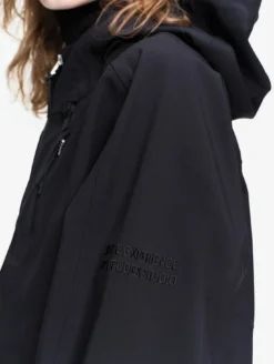 Veste technique à capuche Aigle Experience by Études - Noir